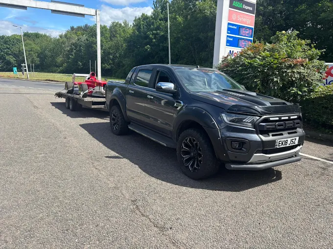 Pickup truck transported on the road